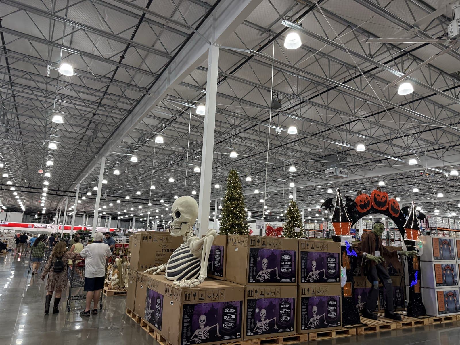 Halloween and Christmas stock share the floor on the warehouse's opening week. Staff photo.